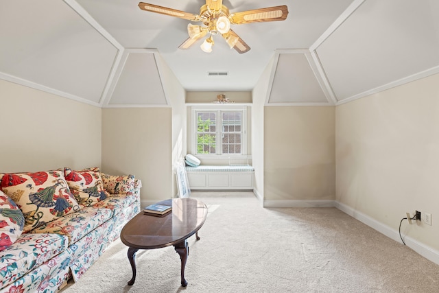 living room with lofted ceiling, carpet flooring, a ceiling fan, and baseboards