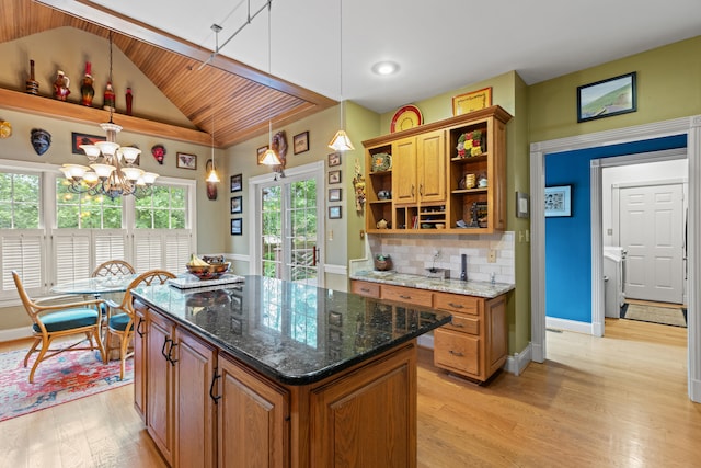 kitchen featuring light wood-style floors, brown cabinetry, open shelves, vaulted ceiling, and wood ceiling