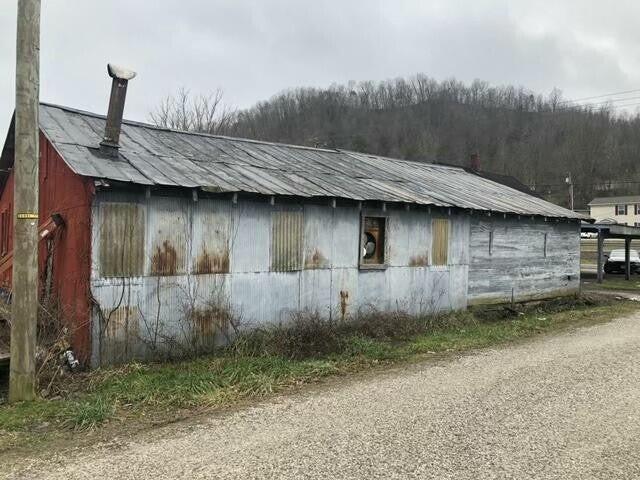 34 Owens Rd S, Clearfield, KY 40313 - view of side of home featuring metal roof