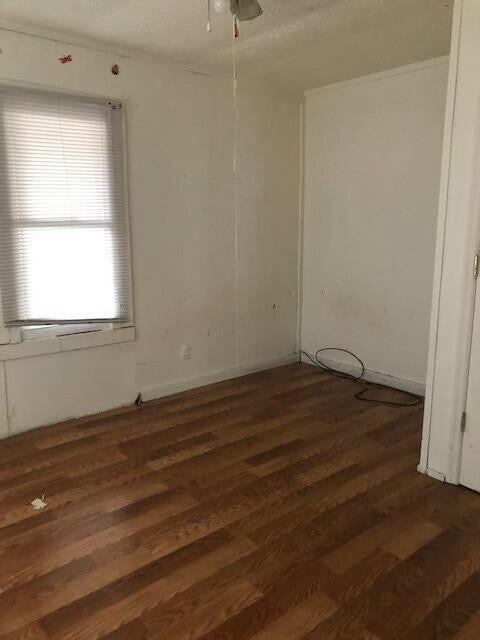 34 Owens Rd S, Clearfield, KY 40313 - empty room featuring wood finished floors and a ceiling fan
