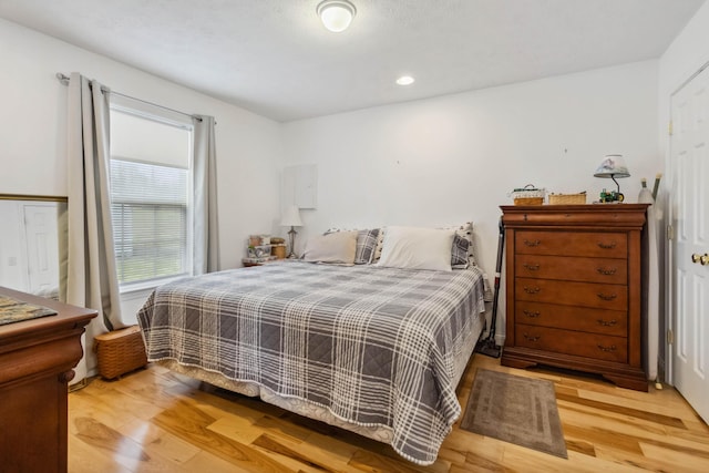 bedroom featuring recessed lighting and light wood finished floors