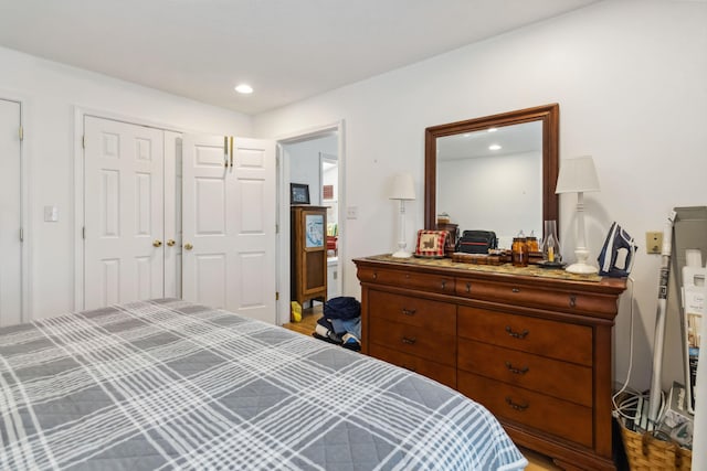 bedroom featuring a closet and recessed lighting