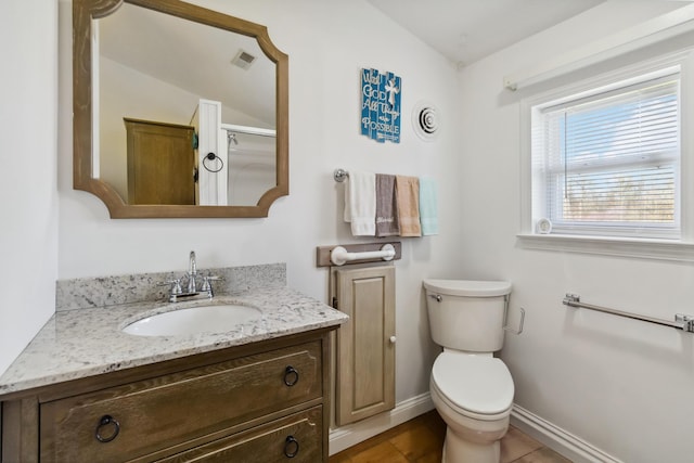 bathroom with visible vents, walk in shower, baseboards, toilet, and vanity