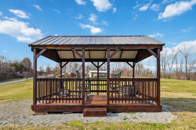 deck with a gazebo and a yard