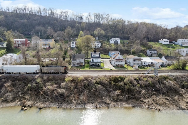 aerial view featuring a water view and a residential view
