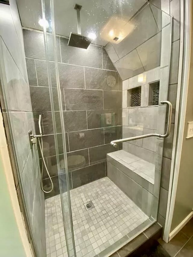 full bathroom featuring a shower stall