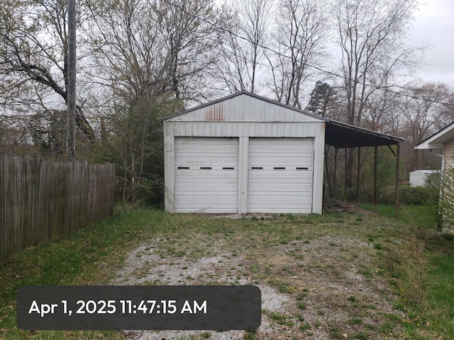 83 Riverside Loop, Lily, KY 40740 - garage featuring a detached garage and fence