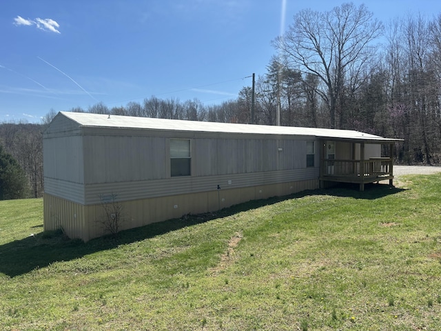 exterior space with a yard