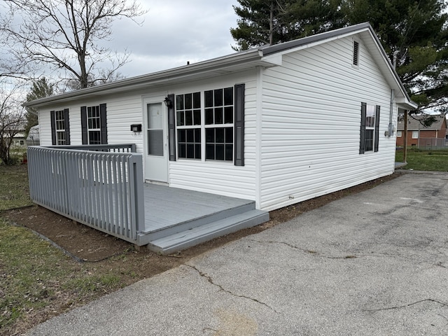 exterior space with a wooden deck
