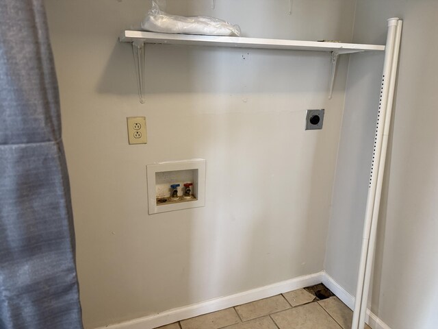 laundry area with hookup for a washing machine, baseboards, laundry area, hookup for an electric dryer, and tile patterned flooring
