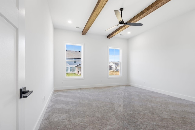 carpeted spare room with beamed ceiling, ceiling fan, recessed lighting, and baseboards