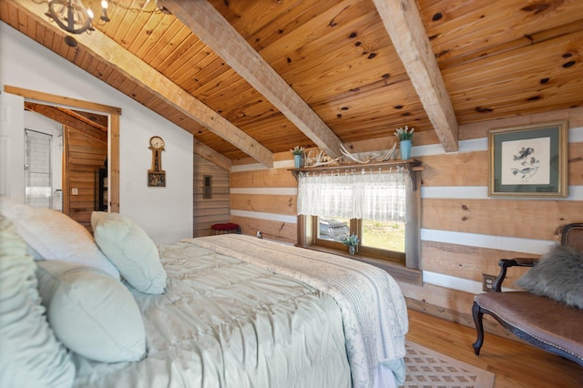 1295 Burger Knob Rd, Junction City, KY 40440 - bedroom with wooden ceiling, wood finished floors, wooden walls, and lofted ceiling with beams