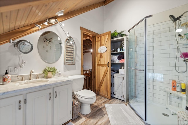 1295 Burger Knob Rd, Junction City, KY 40440 - bathroom with toilet, vanity, wood finished floors, and a shower stall