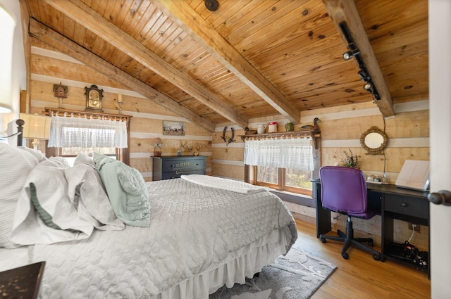 1295 Burger Knob Rd, Junction City, KY 40440 - bedroom with wood walls, lofted ceiling with beams, wood ceiling, track lighting, and wood finished floors