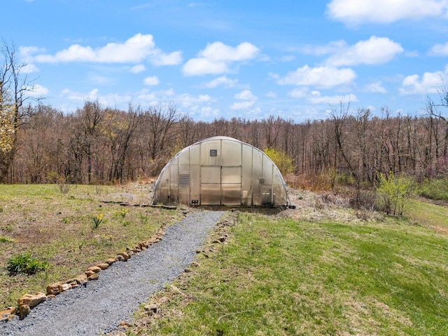 1295 Burger Knob Rd, Junction City, KY 40440 - view of greenhouse with a lawn and a wooded view