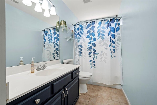bathroom with vanity, visible vents, toilet, a shower with shower curtain, and baseboards