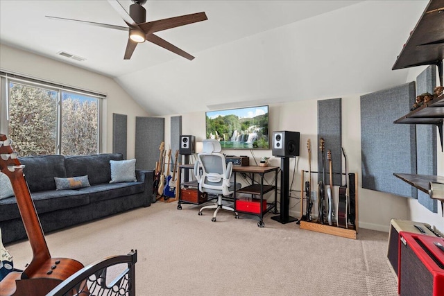 office with vaulted ceiling, a ceiling fan, visible vents, and carpet floors