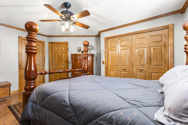 9485 US-60, Morehead, KY 40351 - bedroom featuring a closet, baseboards, ornamental molding, and wood finished floors