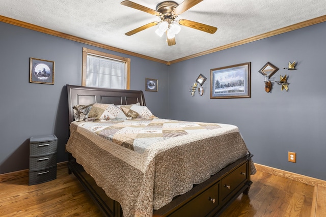 9485 US-60, Morehead, KY 40351 - bedroom featuring crown molding, dark wood-type flooring, baseboards, a textured ceiling, and a ceiling fan