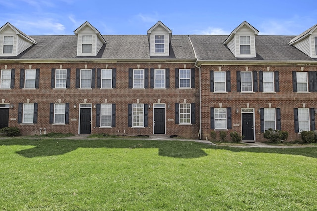 209 Old Todds Rd Unit 9103, Lexington, KY 40504 - view of front facade with brick siding, a shingled roof, and a front lawn
