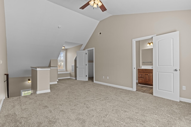 209 Old Todds Rd Unit 9103, Lexington, KY 40504 - unfurnished living room featuring baseboards, ceiling fan, vaulted ceiling, and carpet