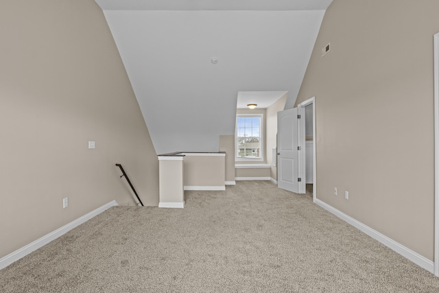 209 Old Todds Rd Unit 9103, Lexington, KY 40504 - carpeted spare room featuring baseboards, visible vents, and vaulted ceiling