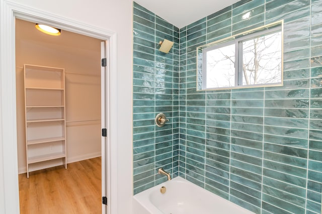 948 Meadow Ln, Lexington, KY 40505 - bathroom featuring a spacious closet, shower / tub combination, and wood finished floors