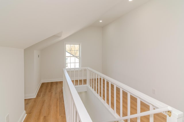 948 Meadow Ln, Lexington, KY 40505 - hallway with an upstairs landing, light wood-type flooring, lofted ceiling, baseboards, and recessed lighting