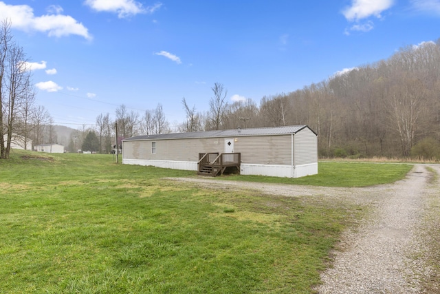 2190 Bluebank Rd, Morehead, KY 40351 - exterior space featuring driveway and a lawn