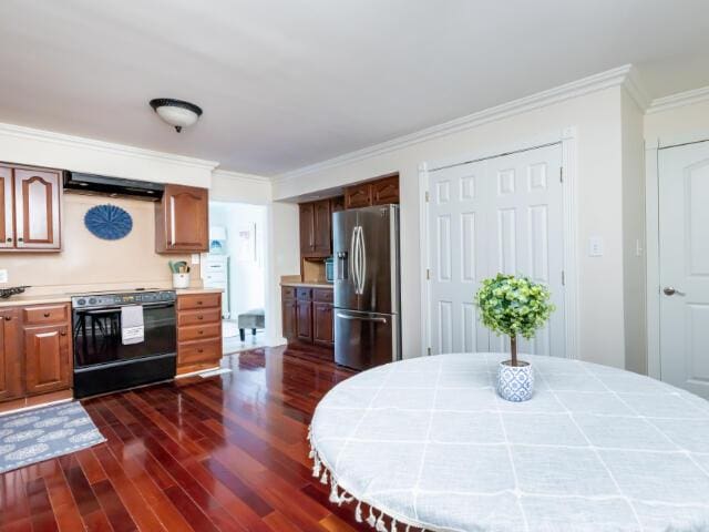 4950 Jennie Kate Ln, Lexington, KY 40510 - interior space with dark wood-style flooring, tile counters, stainless steel fridge, crown molding, and stove