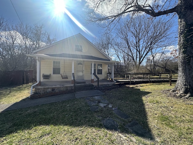 34 Bridge Fork Rd, Whitley City, KY 42653 - bungalow with covered porch and a front yard