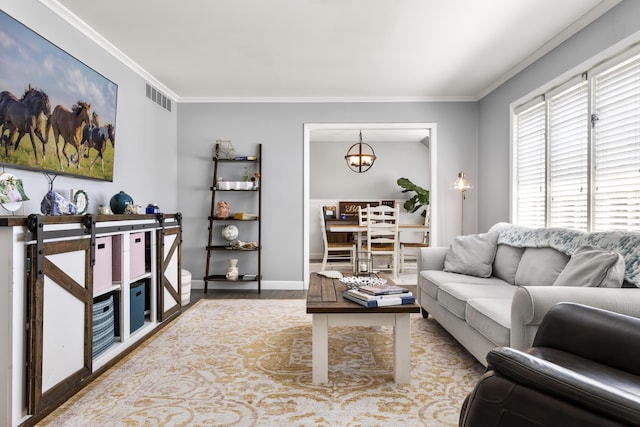 29 Quails Run Ln, West Liberty, KY 41472 - living area with ornamental molding, a chandelier, wood finished floors, and baseboards