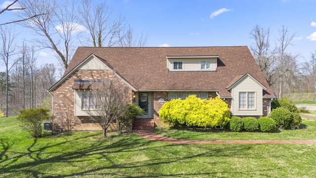 29 Quails Run Ln, West Liberty, KY 41472 - view of front of home with brick siding, a front lawn, and a shingled roof