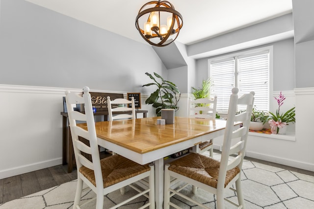 29 Quails Run Ln, West Liberty, KY 41472 - dining area with a chandelier, light wood finished floors, baseboards, and wainscoting