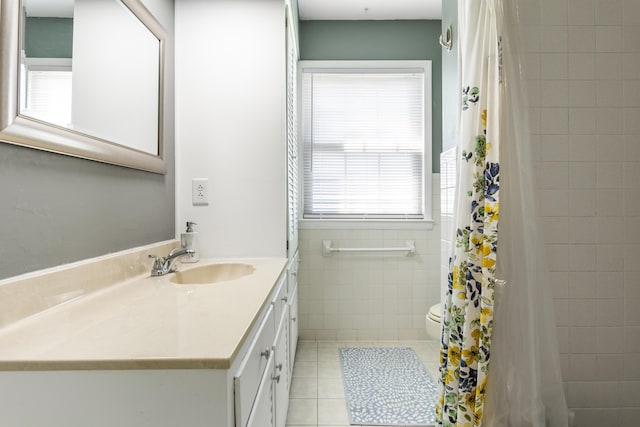 29 Quails Run Ln, West Liberty, KY 41472 - bathroom featuring tile patterned floors, toilet, vanity, a shower with shower curtain, and tile walls