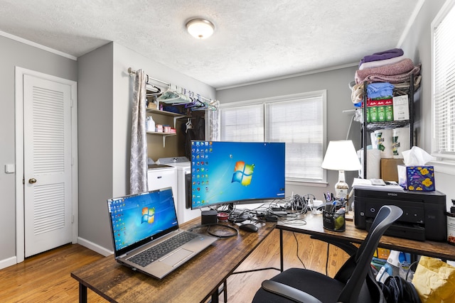 29 Quails Run Ln, West Liberty, KY 41472 - office area with washer and dryer, a textured ceiling, wood finished floors, crown molding, and baseboards