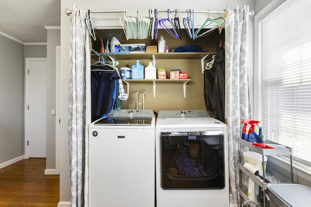 29 Quails Run Ln, West Liberty, KY 41472 - laundry room featuring washing machine and clothes dryer, crown molding, wood finished floors, and baseboards