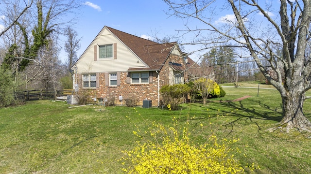 29 Quails Run Ln, West Liberty, KY 41472 - view of home's exterior featuring brick siding and central air condition unit
