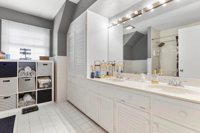 29 Quails Run Ln, West Liberty, KY 41472 - bathroom featuring tiled shower, tile patterned flooring, and double vanity