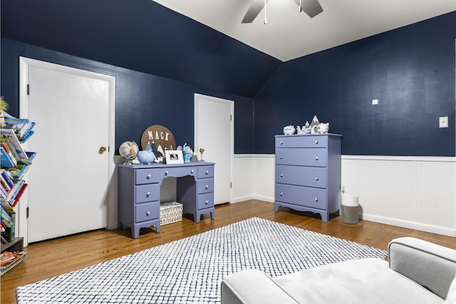 29 Quails Run Ln, West Liberty, KY 41472 - bedroom featuring wainscoting, lofted ceiling, wood finished floors, and ceiling fan