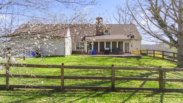 29 Quails Run Ln, West Liberty, KY 41472 - rear view of property featuring a chimney, a patio, and roof with shingles