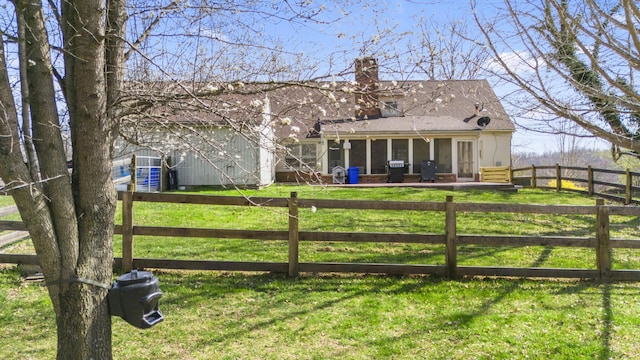 29 Quails Run Ln, West Liberty, KY 41472 - rear view of property featuring a chimney and a sunroom