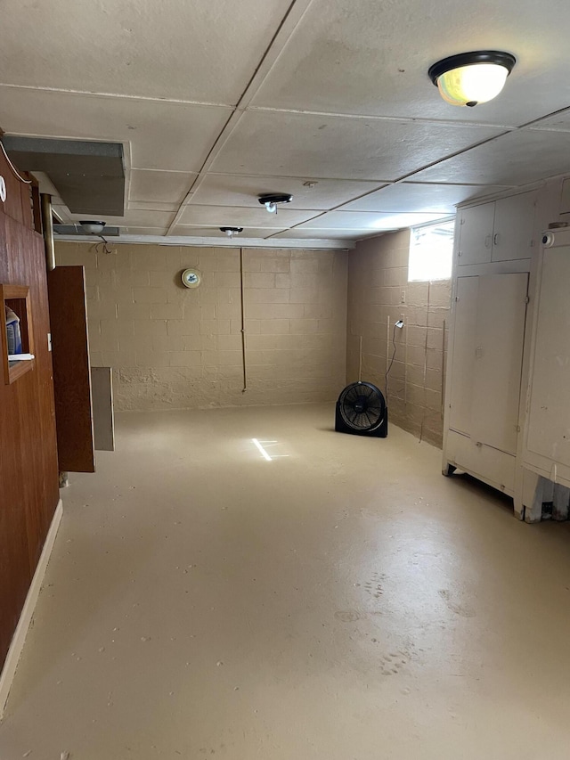 below grade area with concrete block wall