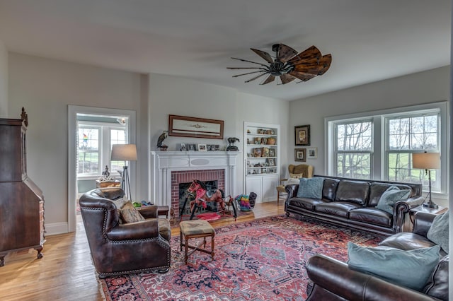 443 Hutchison Rd, Paris, KY 40361 - living room with a healthy amount of sunlight, light wood finished floors, and ceiling fan
