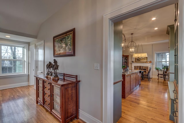 443 Hutchison Rd, Paris, KY 40361 - hallway featuring baseboards, light wood-style floors, lofted ceiling, and recessed lighting