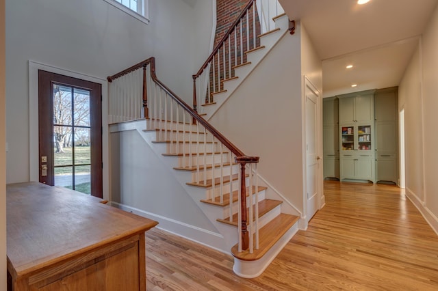 443 Hutchison Rd, Paris, KY 40361 - stairway with a wealth of natural light, wood finished floors, recessed lighting, and a towering ceiling