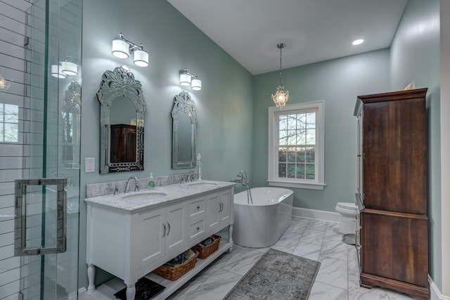 443 Hutchison Rd, Paris, KY 40361 - bathroom with marble finish floor, baseboards, a freestanding tub, and a sink