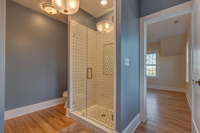 443 Hutchison Rd, Paris, KY 40361 - bathroom featuring baseboards, visible vents, wood finished floors, and a shower stall