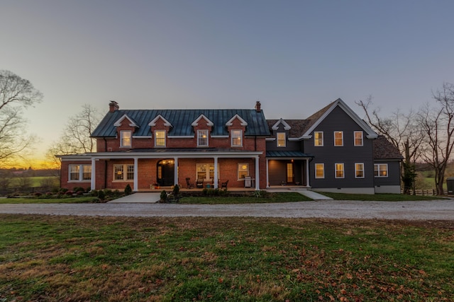 443 Hutchison Rd, Paris, KY 40361 - view of front of home featuring a chimney, a standing seam roof, a porch, and a yard
