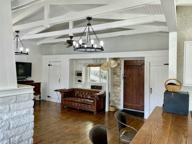living room featuring wood-type flooring, lofted ceiling with beams, and ceiling fan with notable chandelier